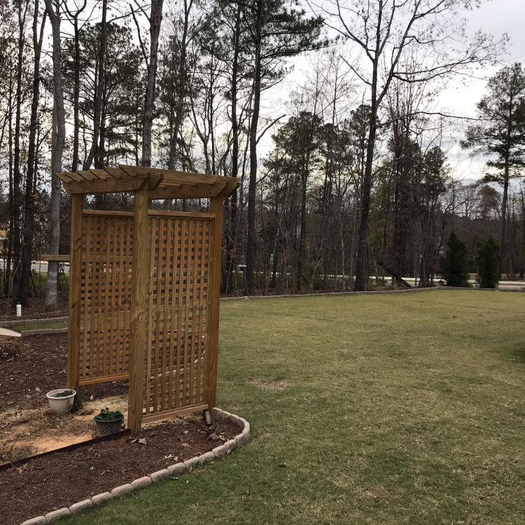 Arbor and with stained wood